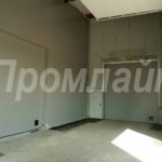 Промышленные секционные подъемные ворота Doorhan